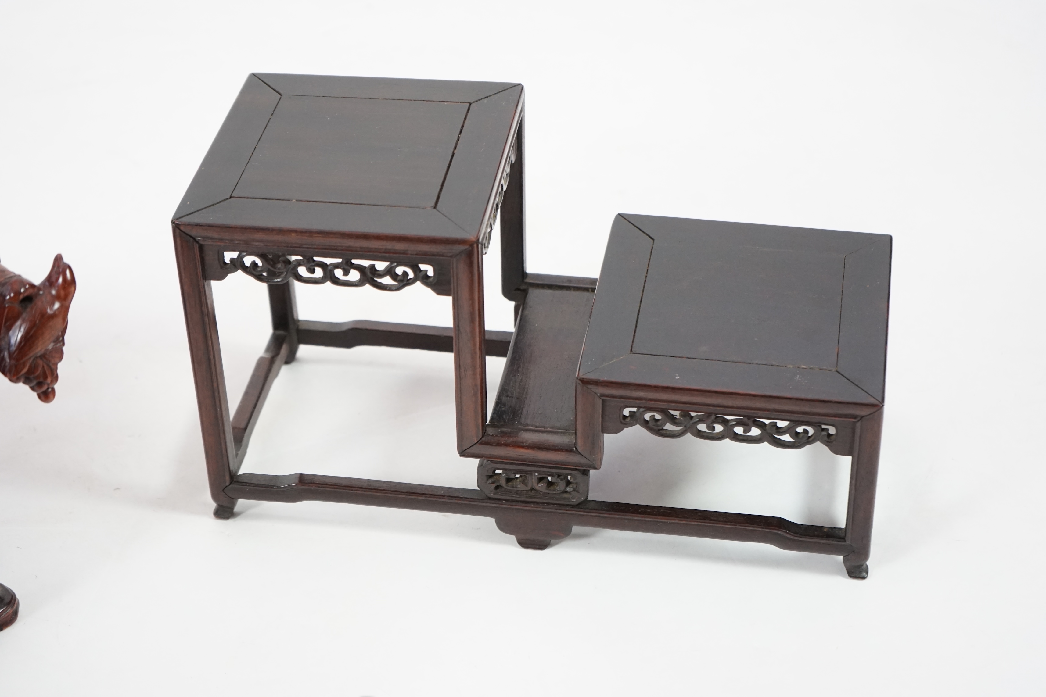 Three Chinese carved wood stands, 19th/early 20th century